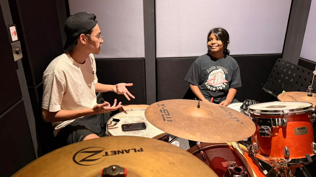 Drum lesson at Selah Worship Academy